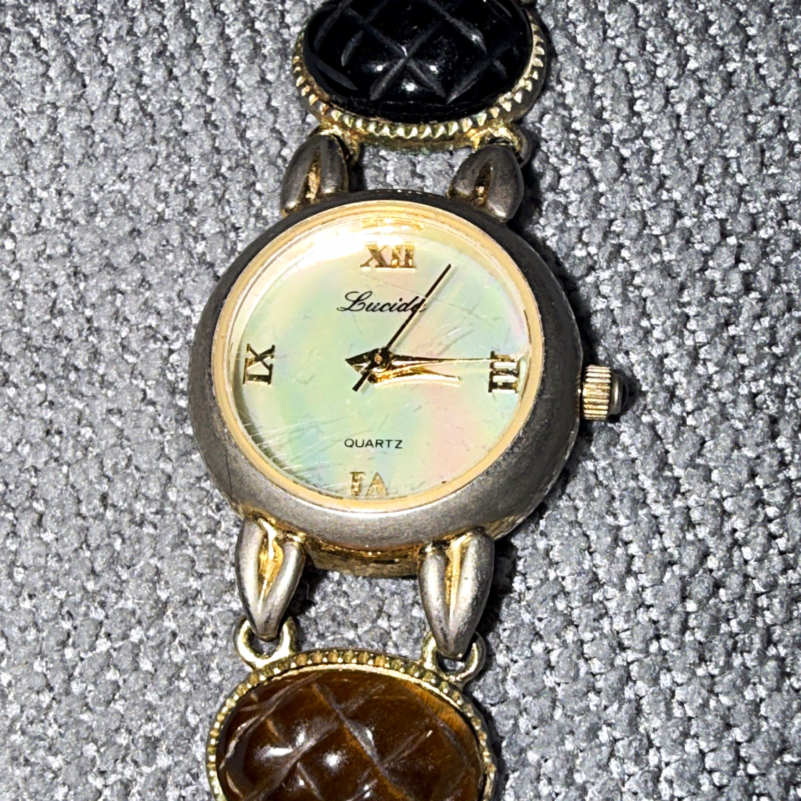 Lucida scarab Quartz Women’s Dress Watch Iridescent Dial Roman Numerals Bracelet
