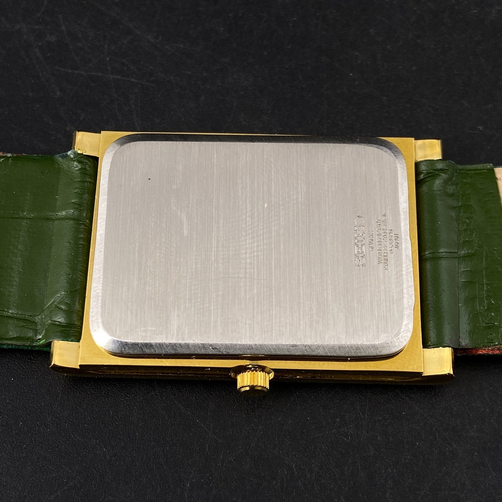 Vintage Seiko Slim Quartz Green Face Rectangle Japanese 26MM Case Mens Watch S03