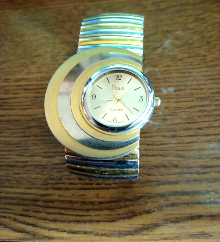 Vivani Quartz Watch Crescent Moon Shape Gold /Silver Tone Runs Well .