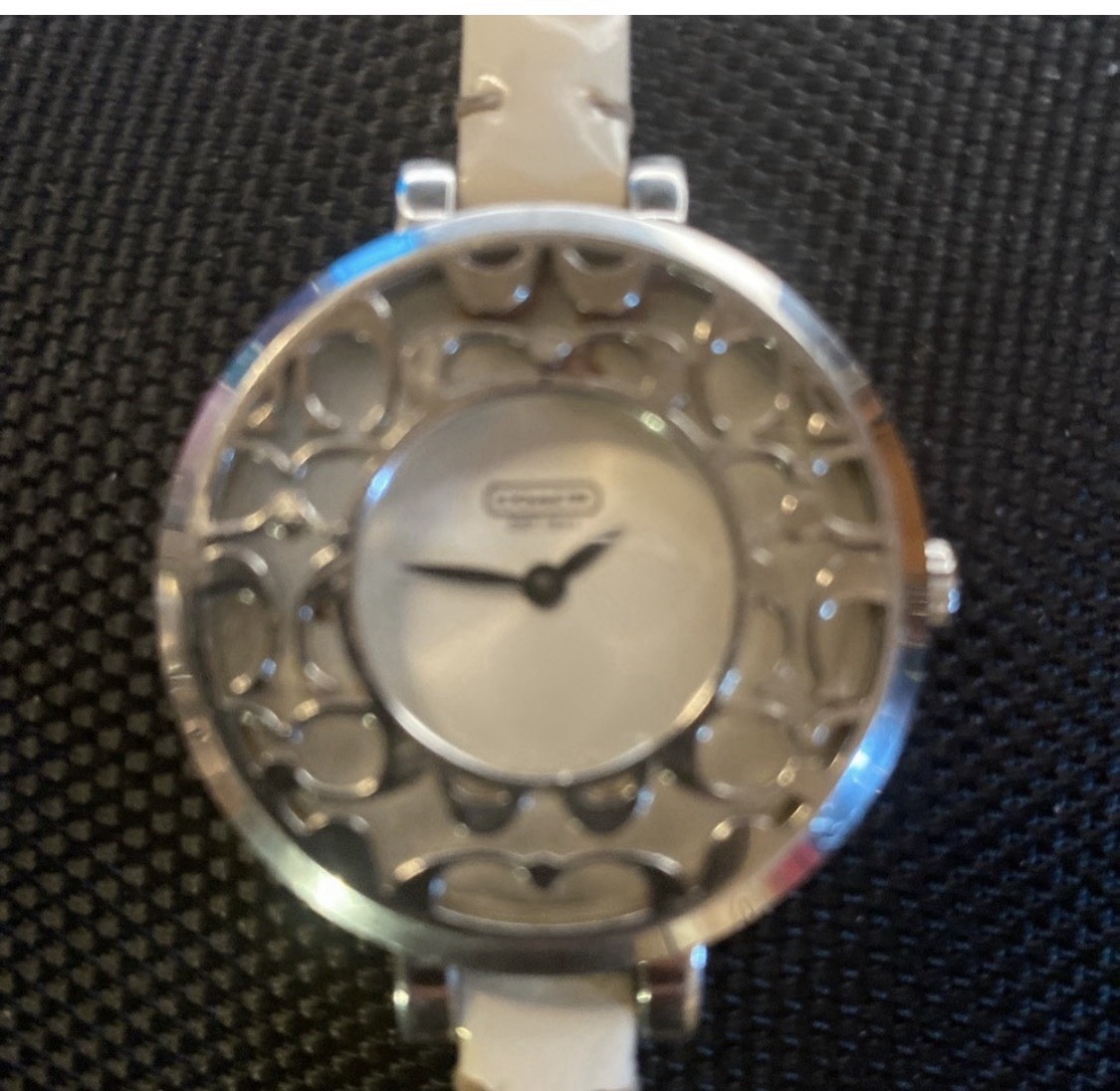 Coach ladies’ Sabrina 14501433 stainless steel silver quartz watch.