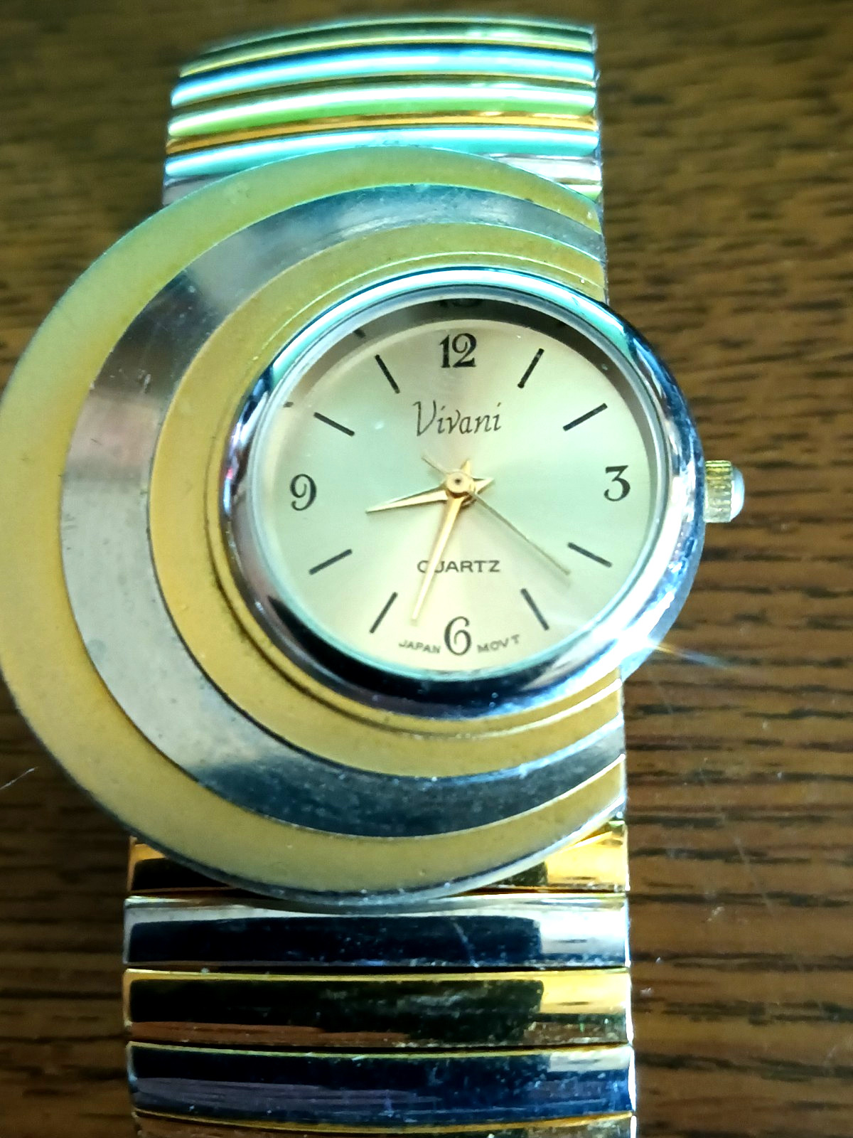 Vivani Quartz Watch Crescent Moon Shape Gold /Silver Tone Runs Well .