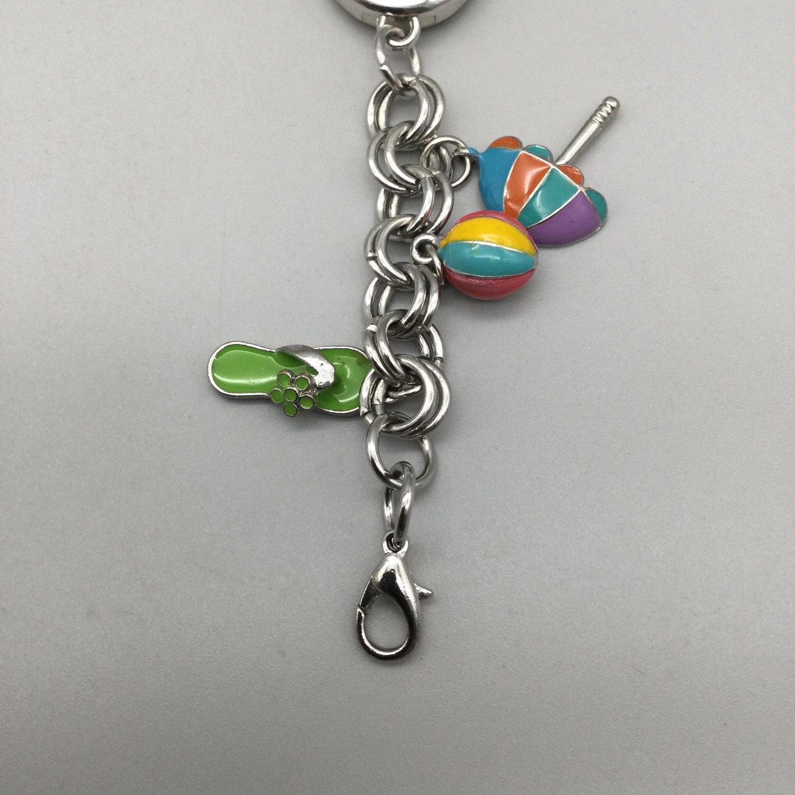 Bay Studio Charm Watch Womens 22mm Silver Tone Beach Charms New Battery 7.5″