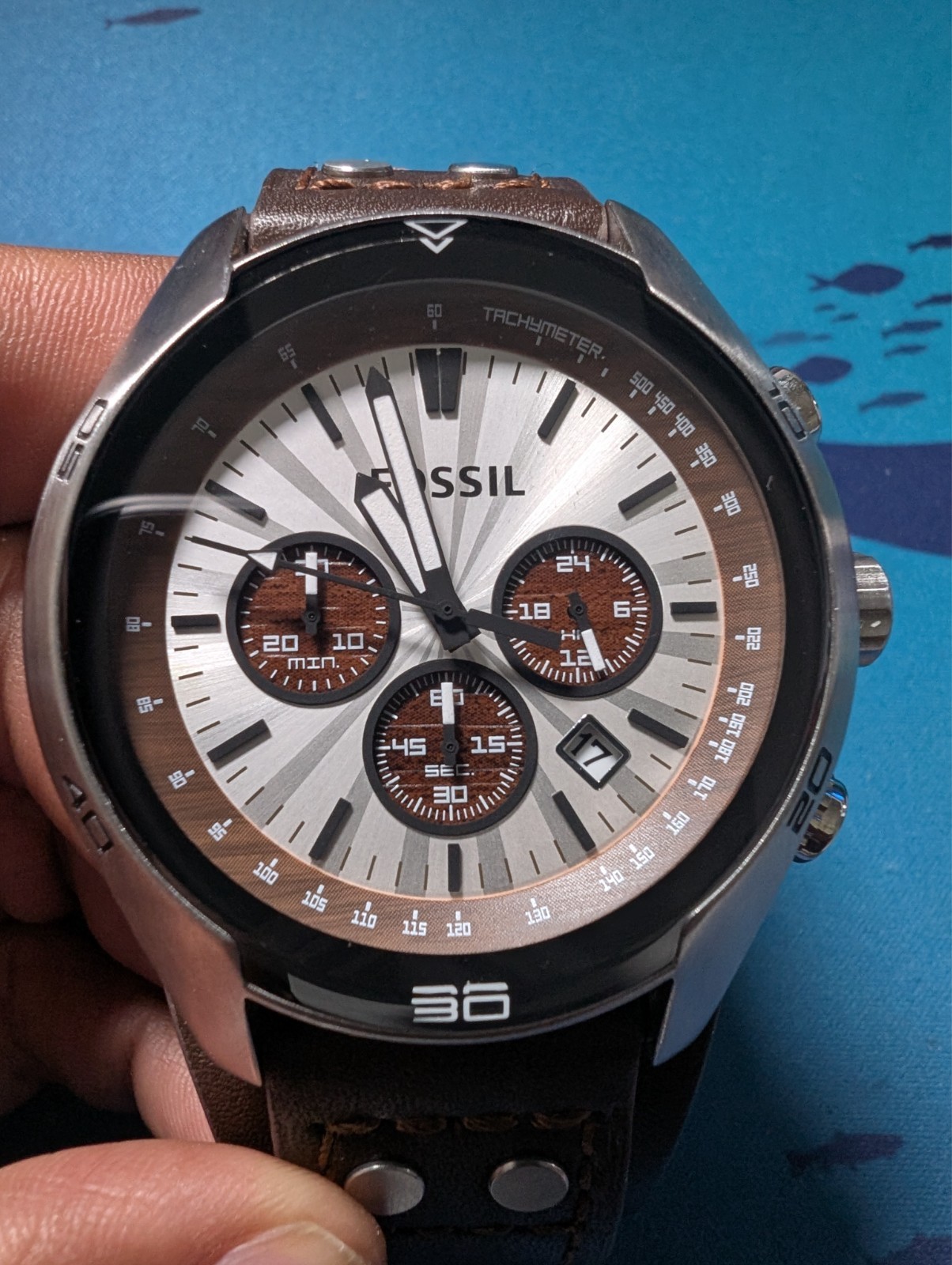 Fossil Coachman Silver Dial Brown Leather Band Men’s Watch (CH2565)