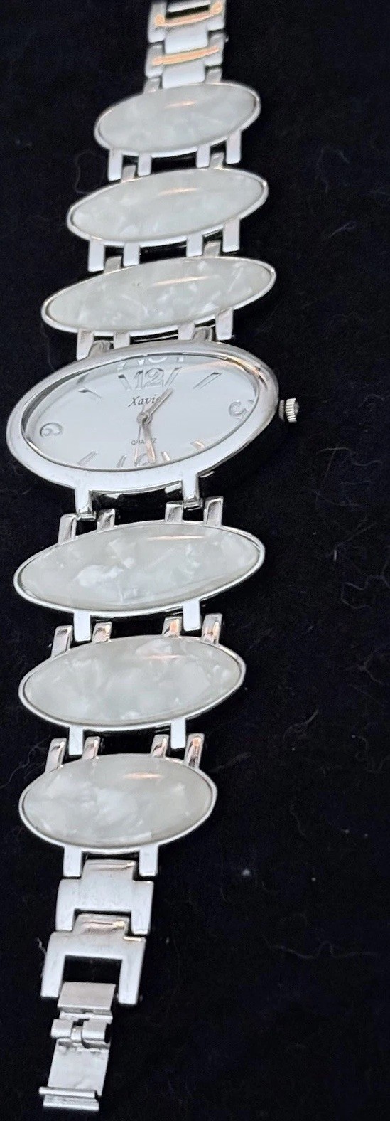 Vintage Xavier Women’s Quartz Silver Toned and mother of pearl color watch. Q