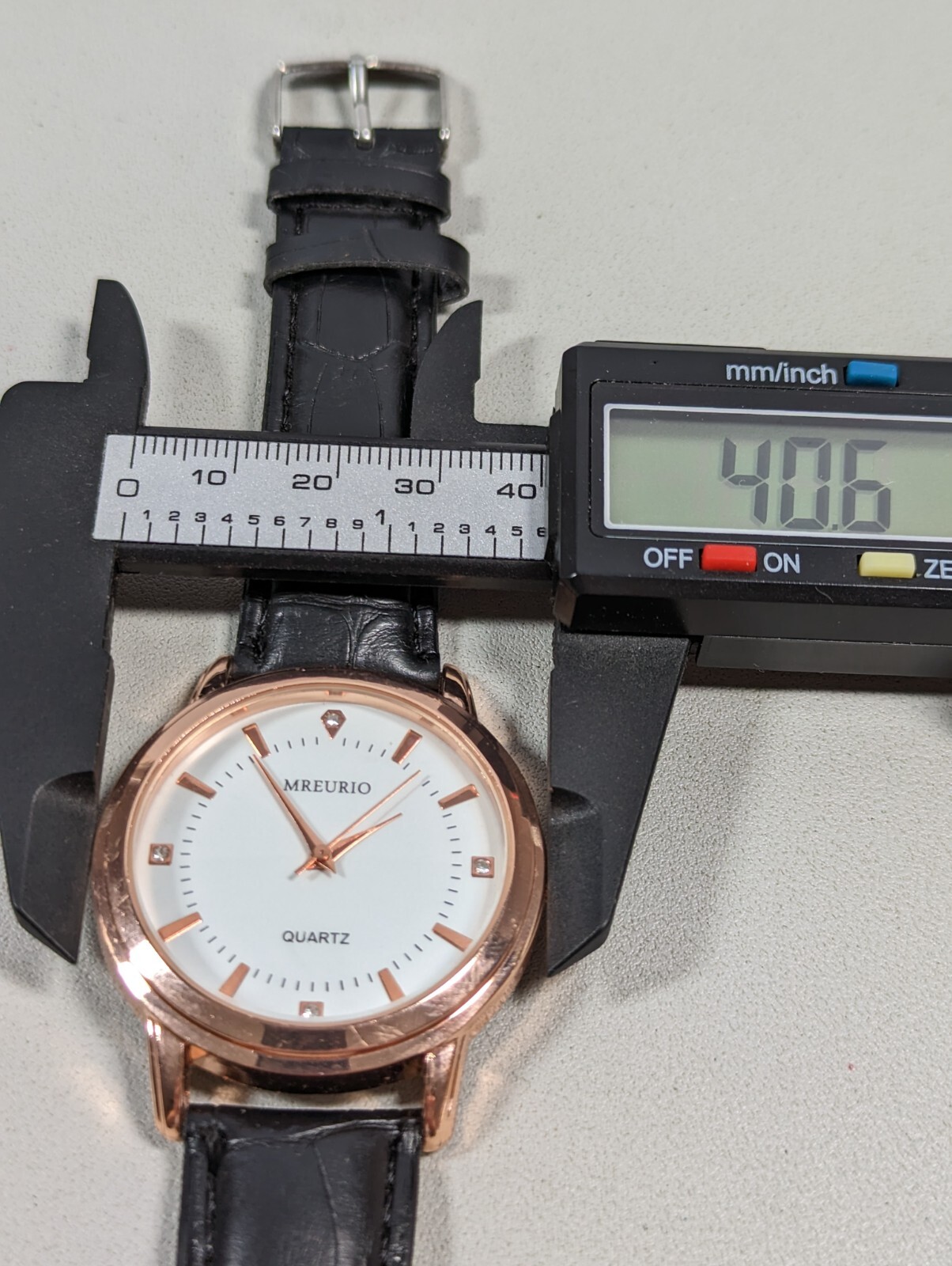 Mreurio White Dial Round Gold Tone Case Black Faux Leather Band Watch