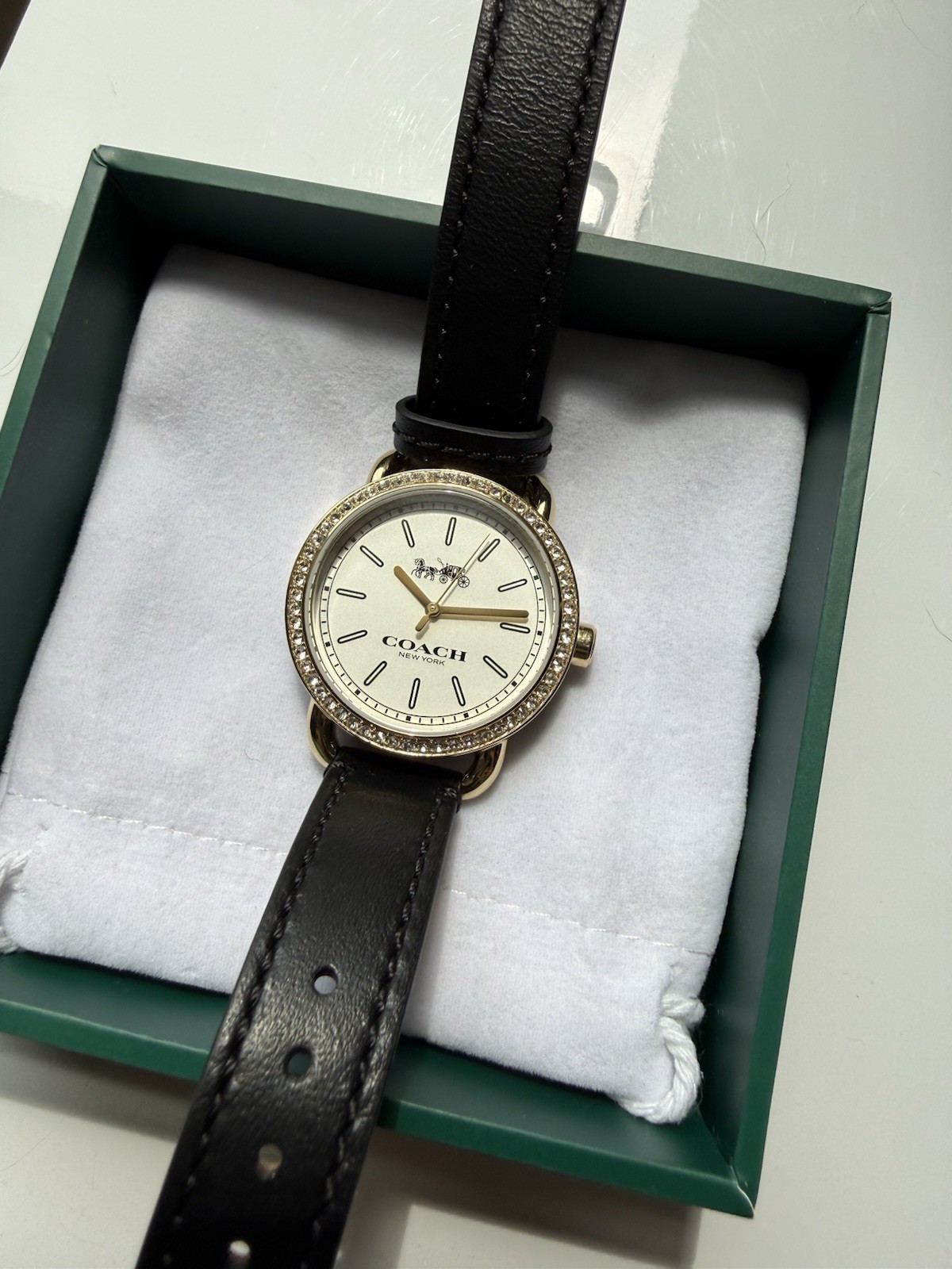 Coach Lex Women’s 28mm Quartz White Dial Gold Tone Crystal Bezel Black Leather