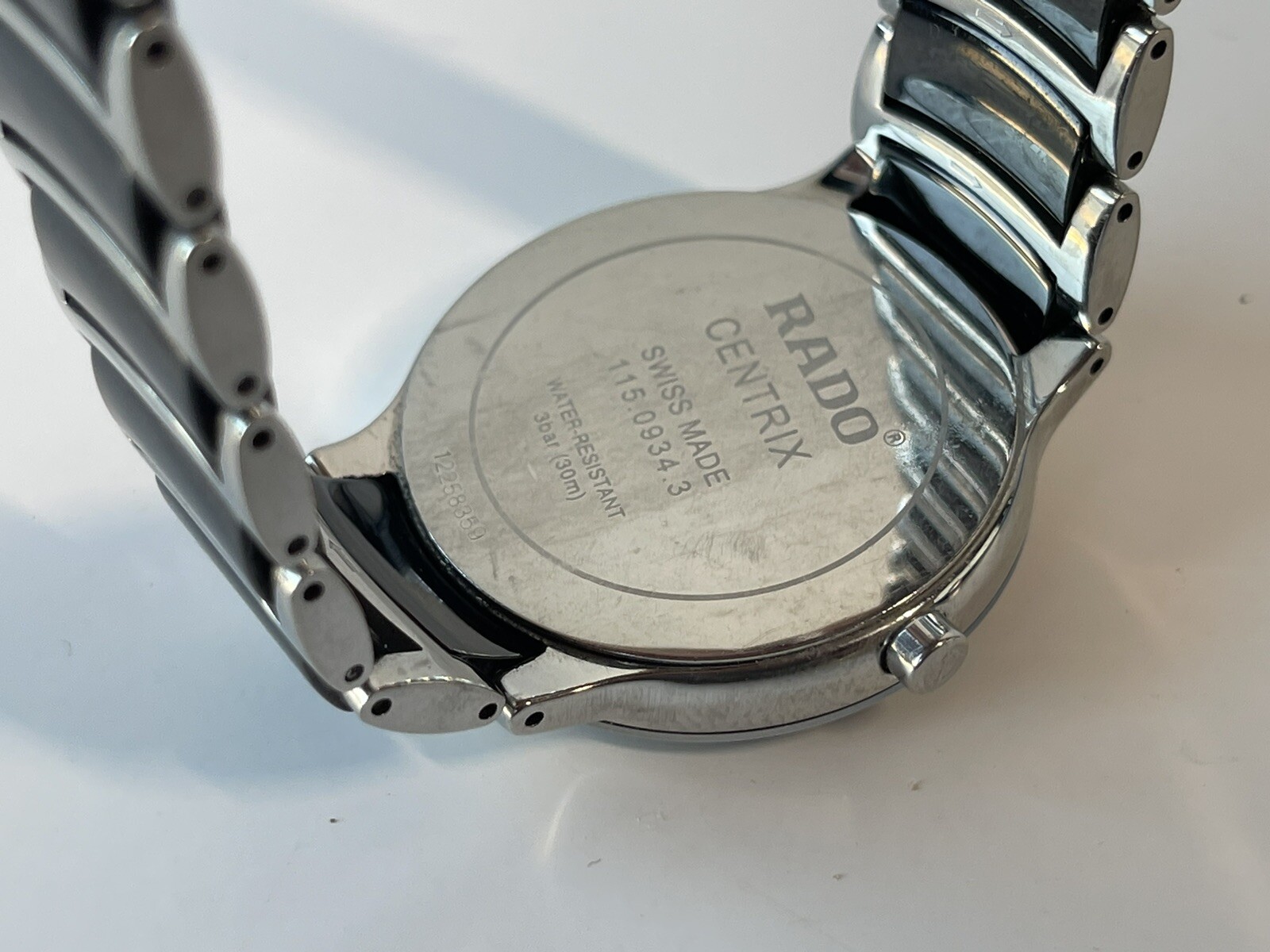Rado Centrix Black Dial Unisex Watch, ceramic bracelet with titanium clasp.