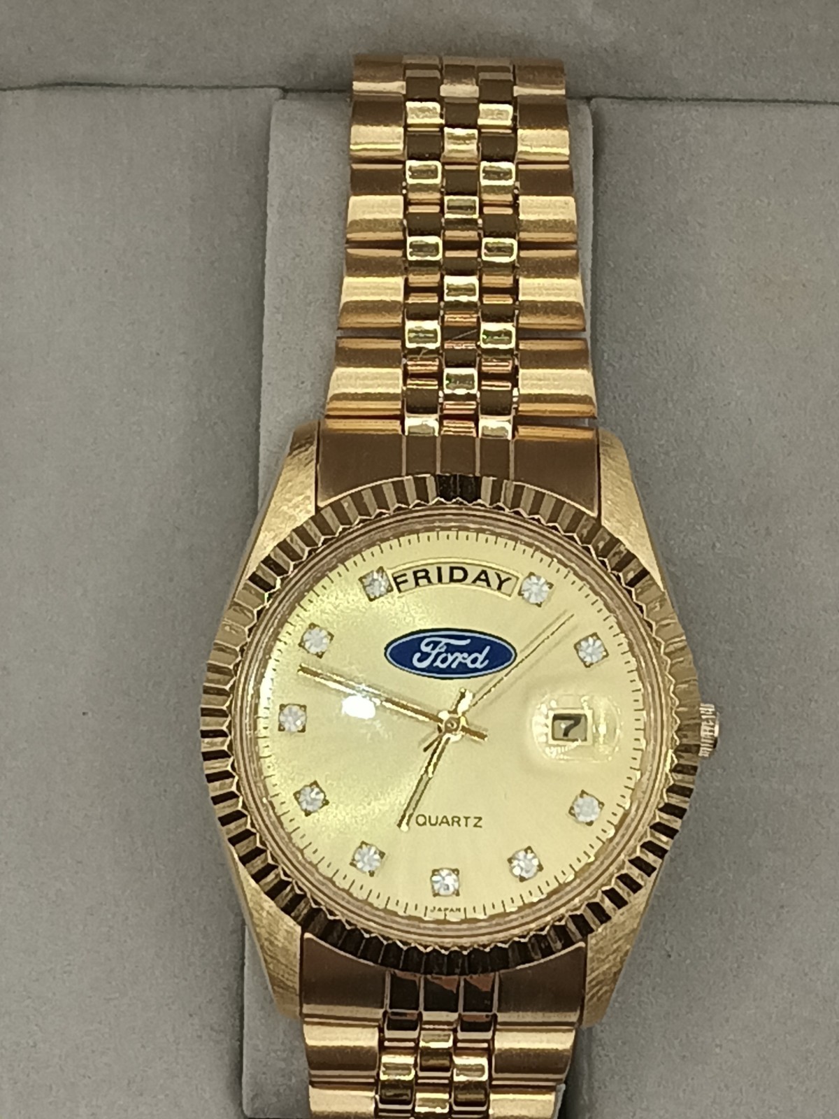 FORD GOLD TONE COLLECTORS WATCH WITH DAY AND DATE