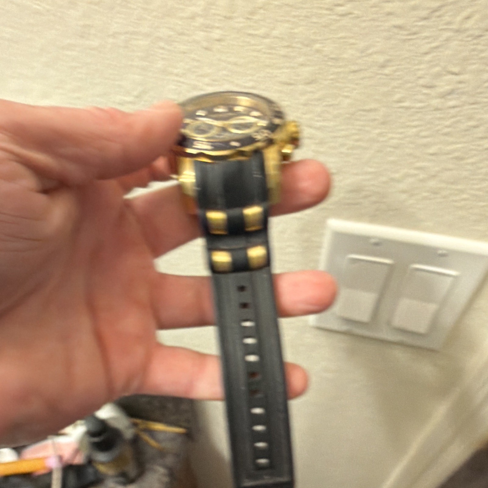 Invicta Men’s Chronograph Quartz 100m Black Dial Gold Tone Rubber Strap 45mm