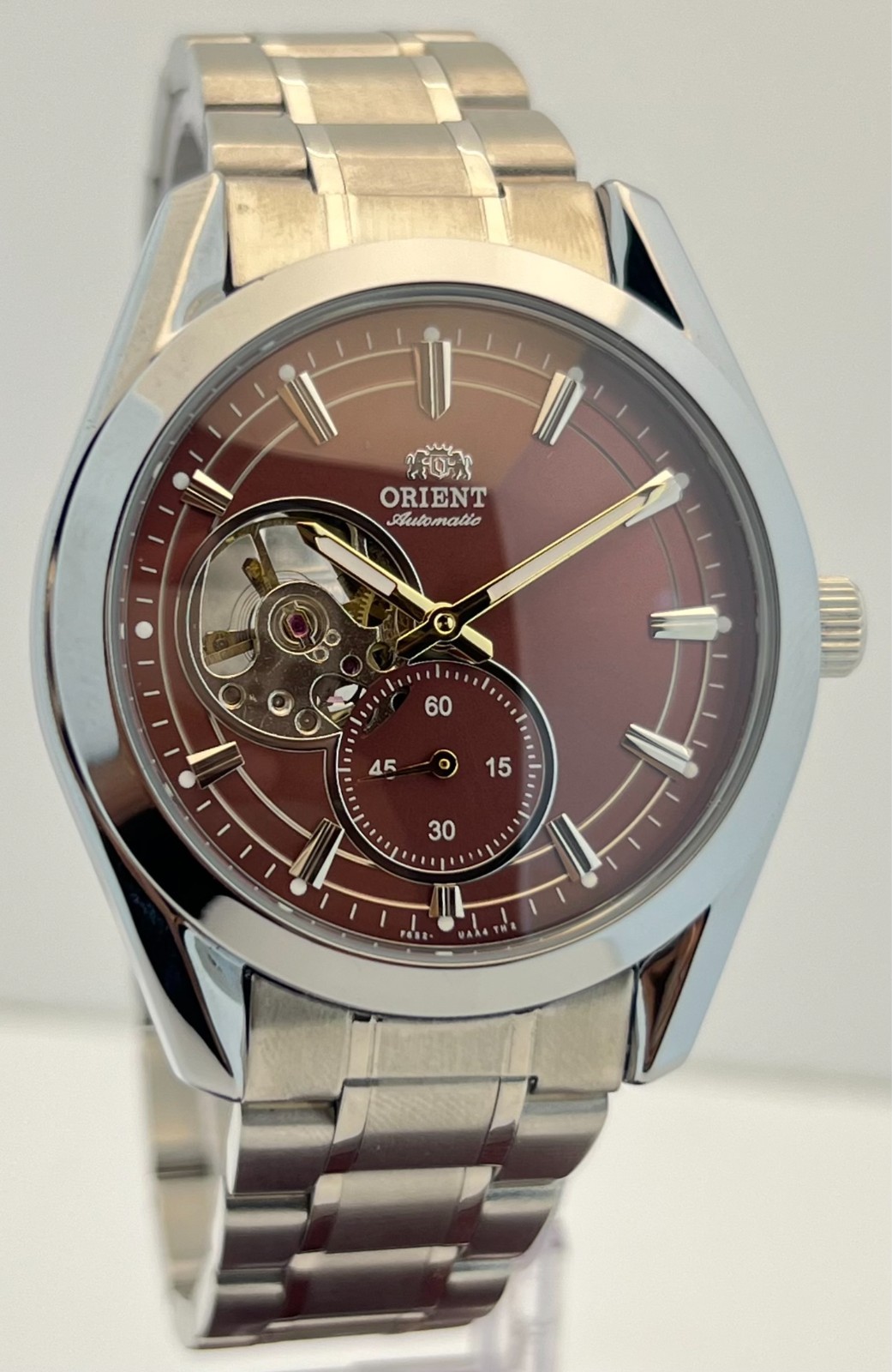 Luxurious Men’s Orient Contemporary Open Heart Automatic Brown Dial Wristwatch