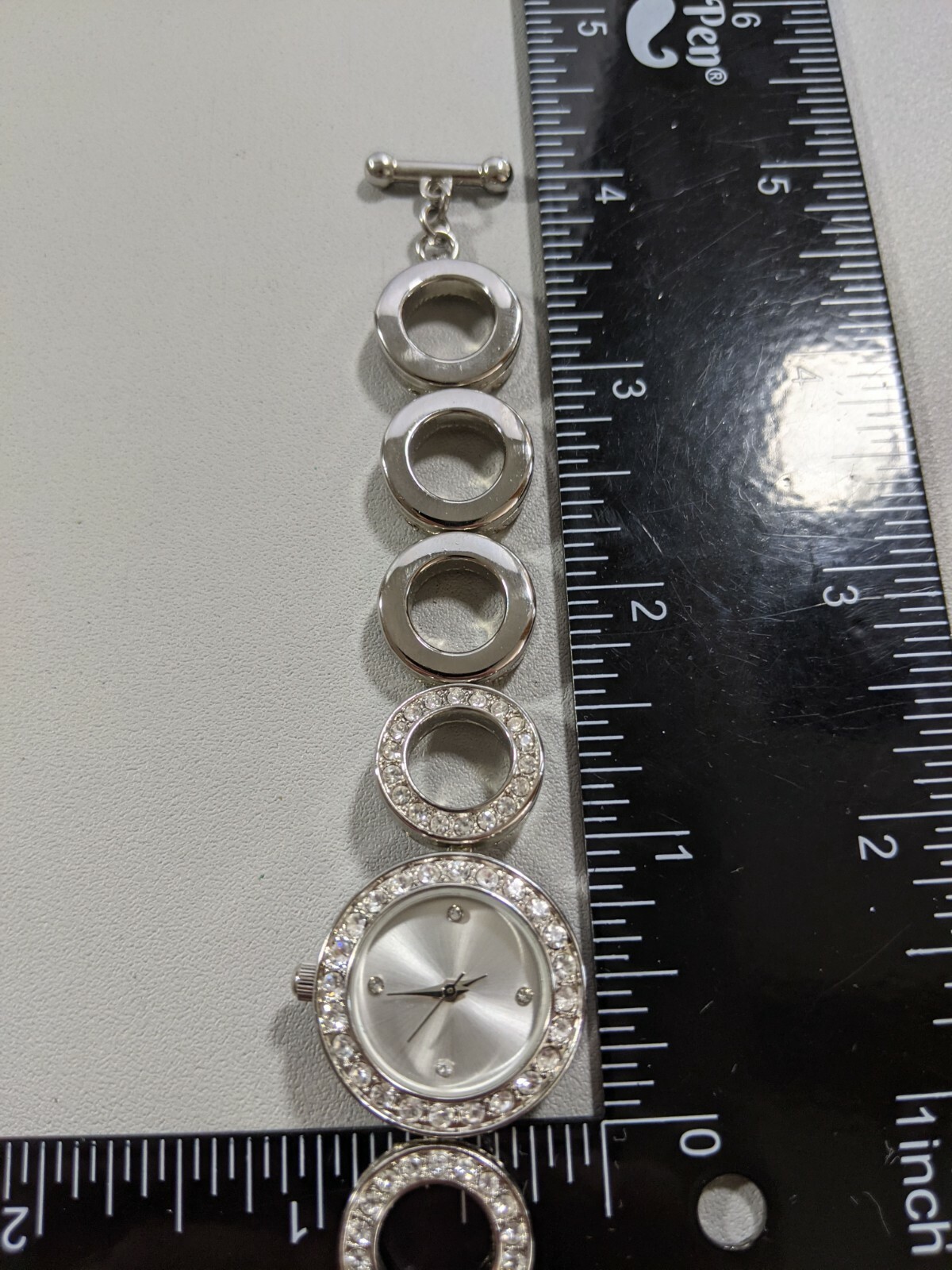 Allude Silver Tone Dial Round Case Crystal Accent Bezel Circle Link Toggle Watch