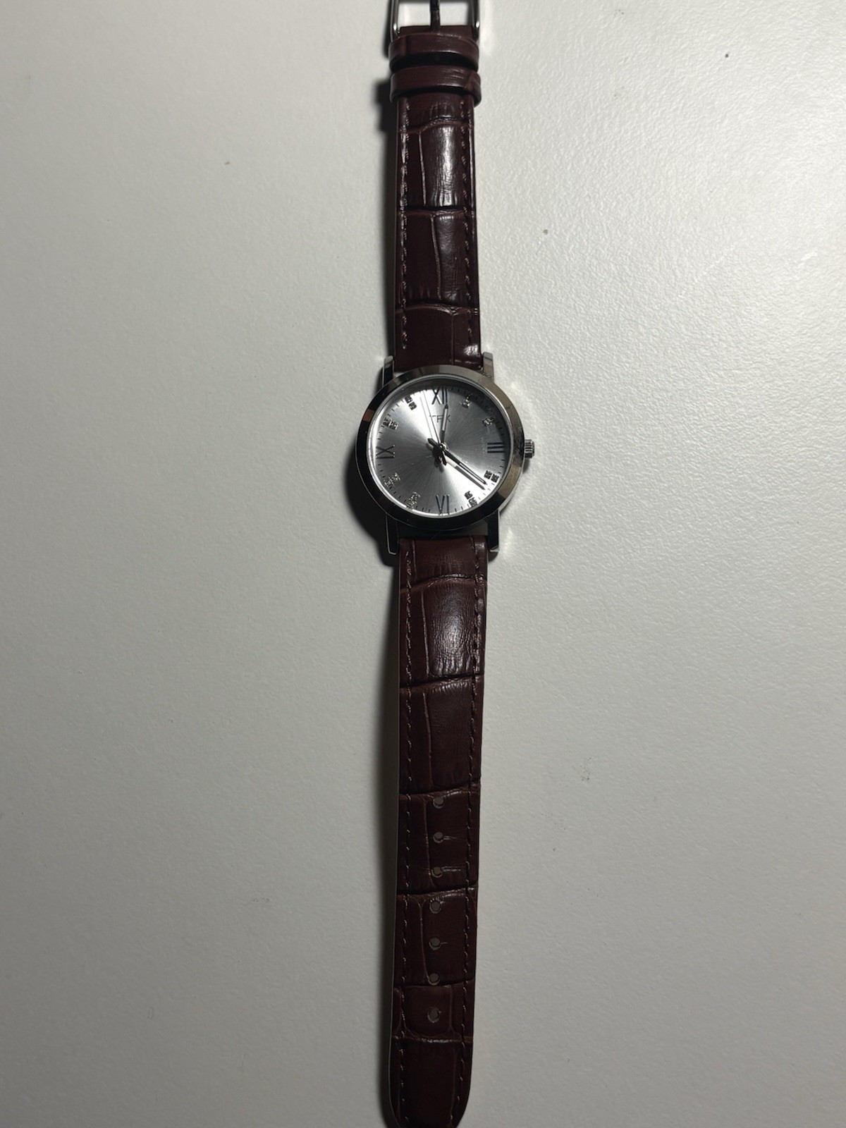 Bulova TFX Women’s Quartz Watch Silver Roman Dial Brown Leather Strap