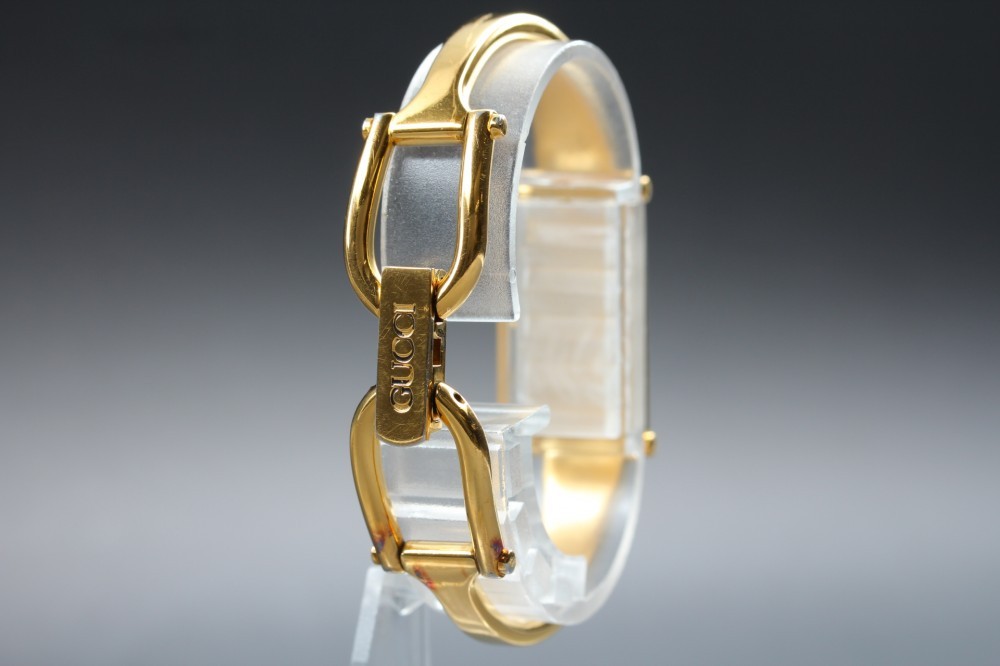 GUCCI 1500 Black Dial Rectangular Gold Bangle Quartz 12mm Ladies Watch