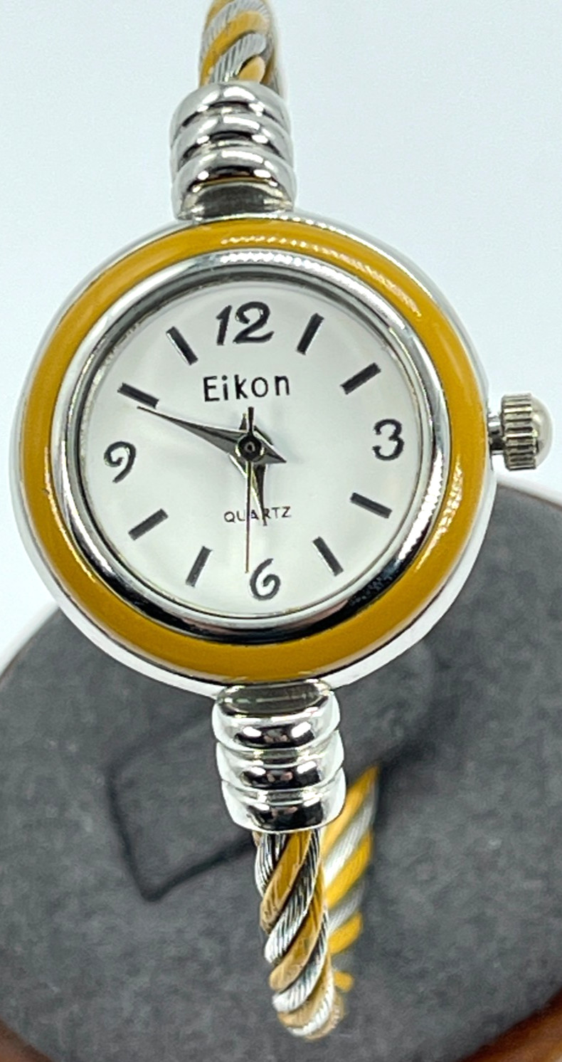 Watch Eikon Quartz White Face, Silver Numbers, 7′ Gold/Steel Twist Bracelet