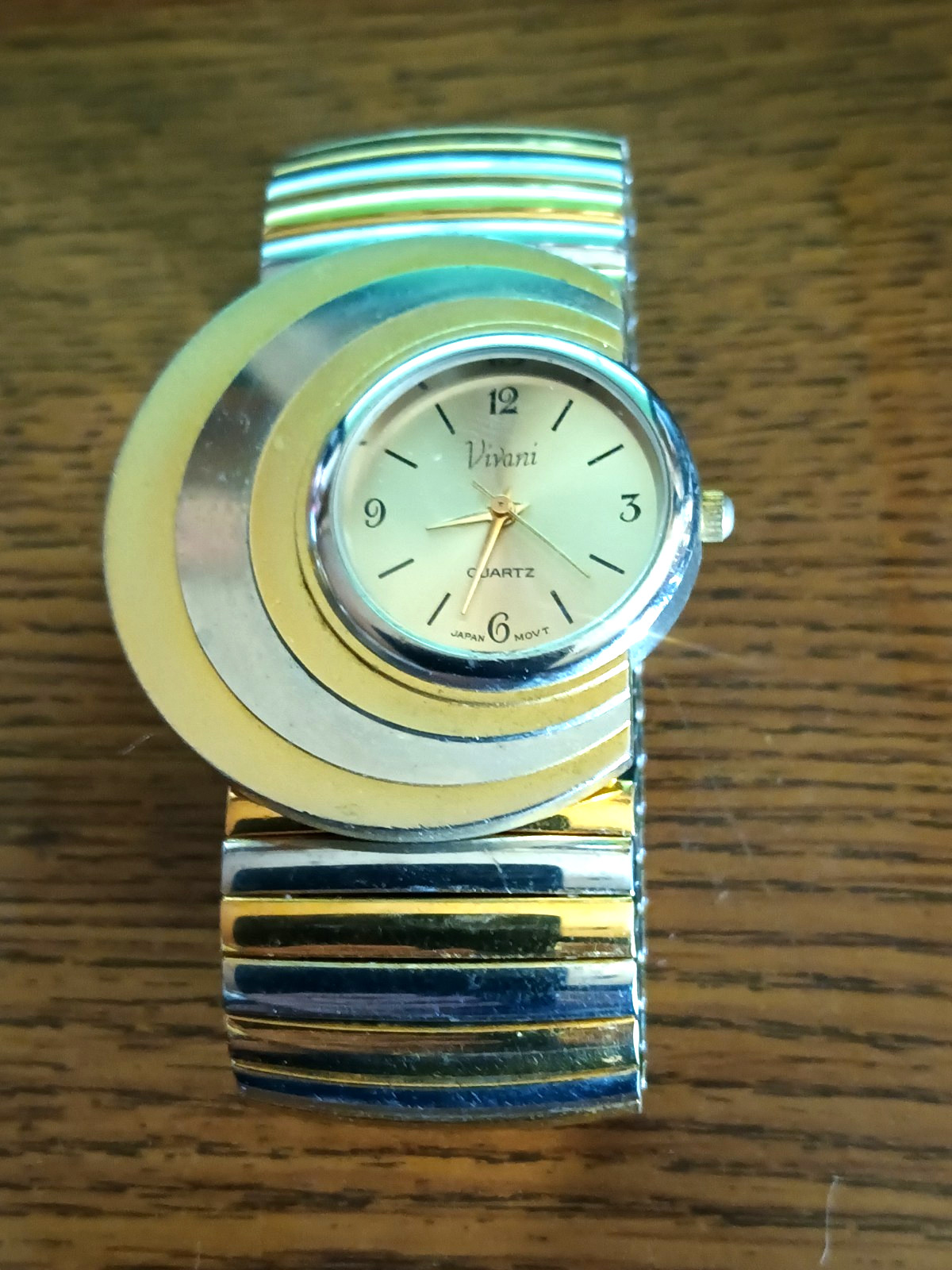 Vivani Quartz Watch Crescent Moon Shape Gold /Silver Tone Runs Well .