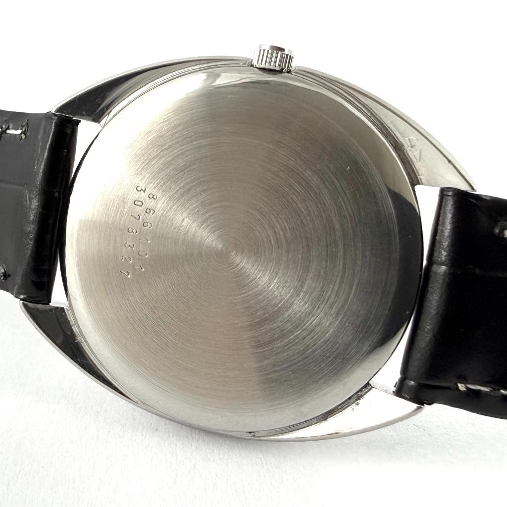 ELEGANT UNIVERSAL WHITE SHADOW MICRO-ROTOR THIN CAL 2–66 VINTAGE BLACK DIAL