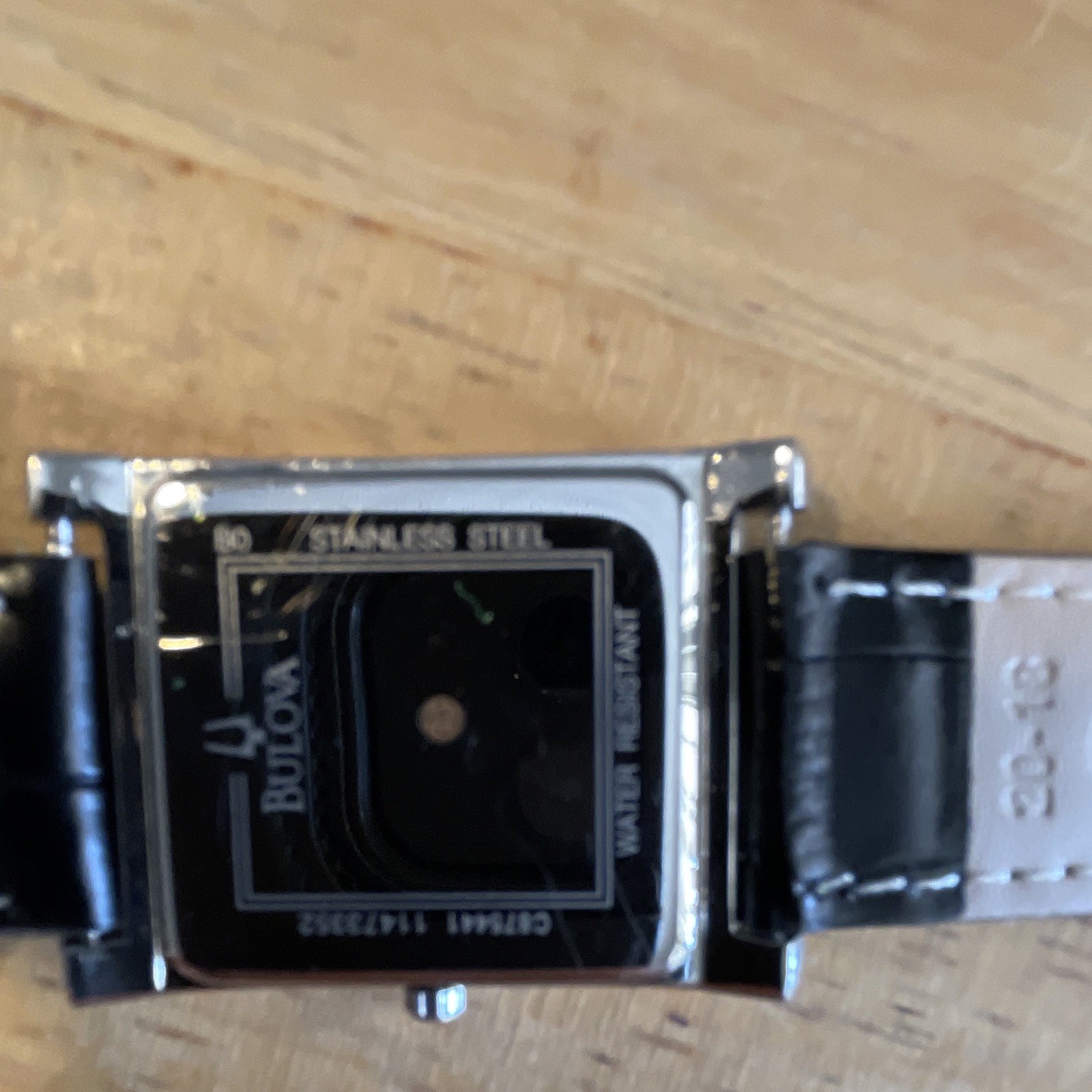 Bulova Quartz Analog Watch 28mm Silver Textured Dial Black Leather Strap WR