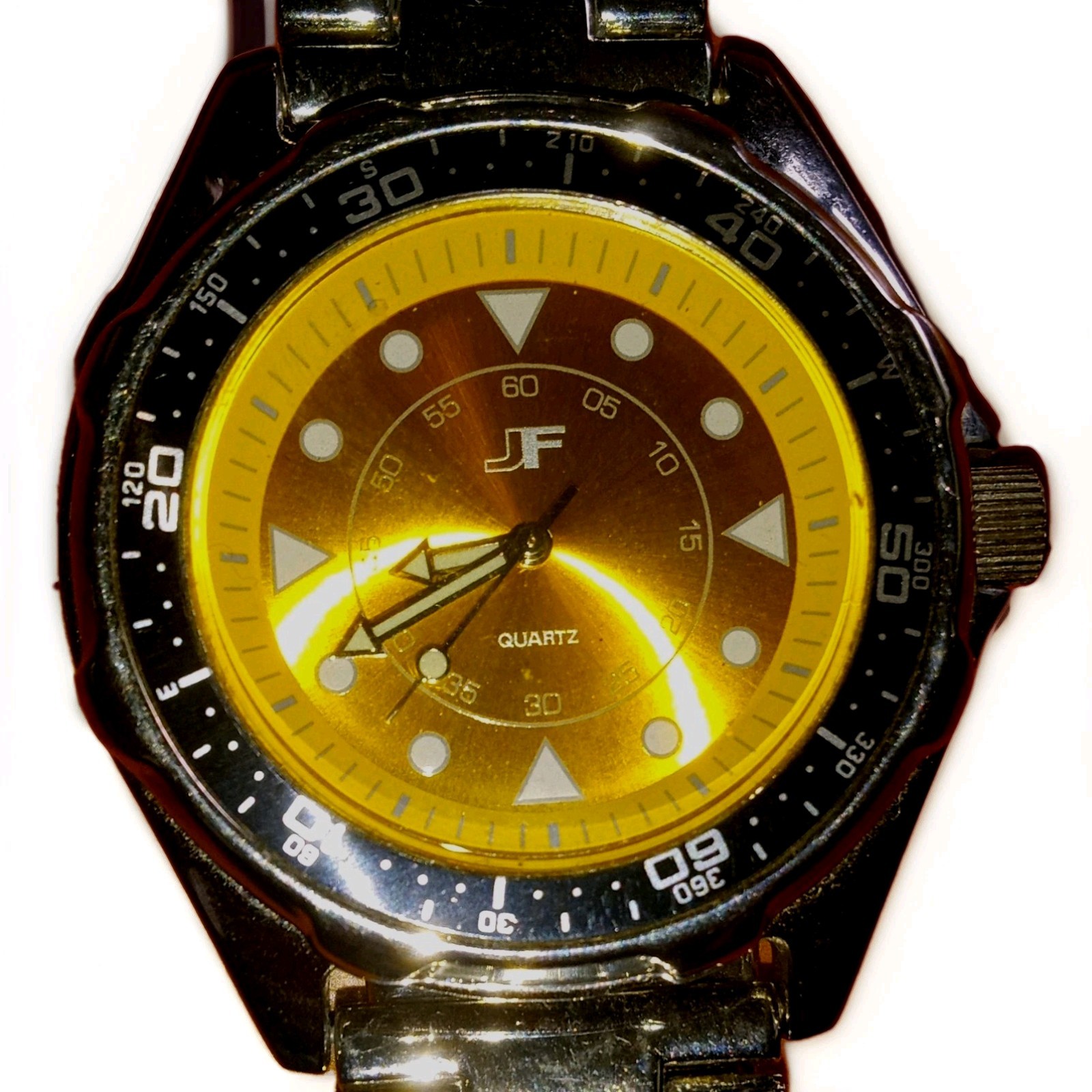 JF Quartz Analog Wristwatch Gold Dial Black Fixed Bezel Silver Bracelet