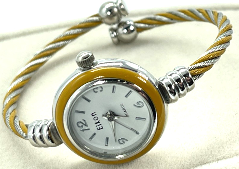 Watch Eikon Quartz White Face, Silver Numbers, 7′ Gold/Steel Twist Bracelet