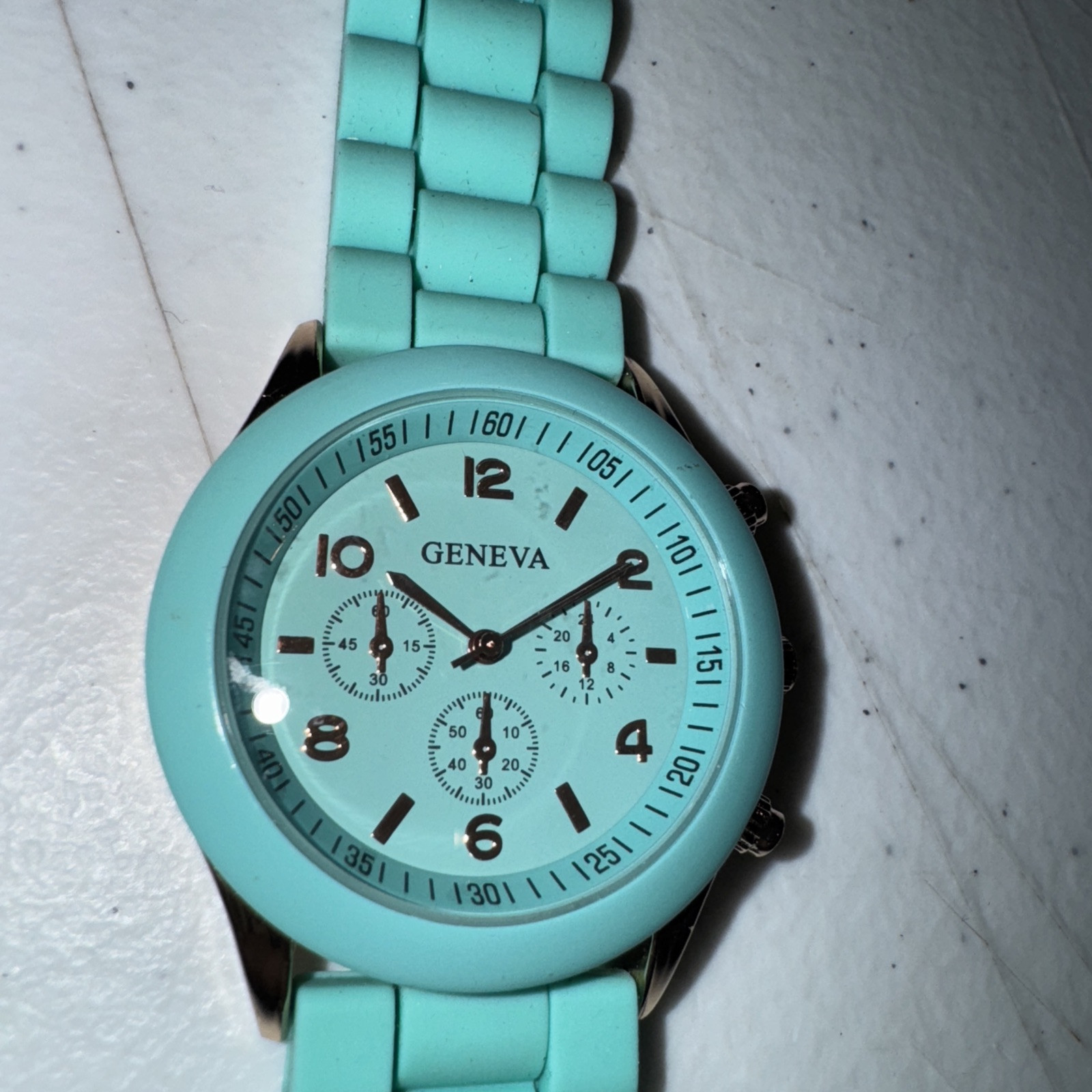 Geneva turquoise watch with rose gold rubber/Silicone- used