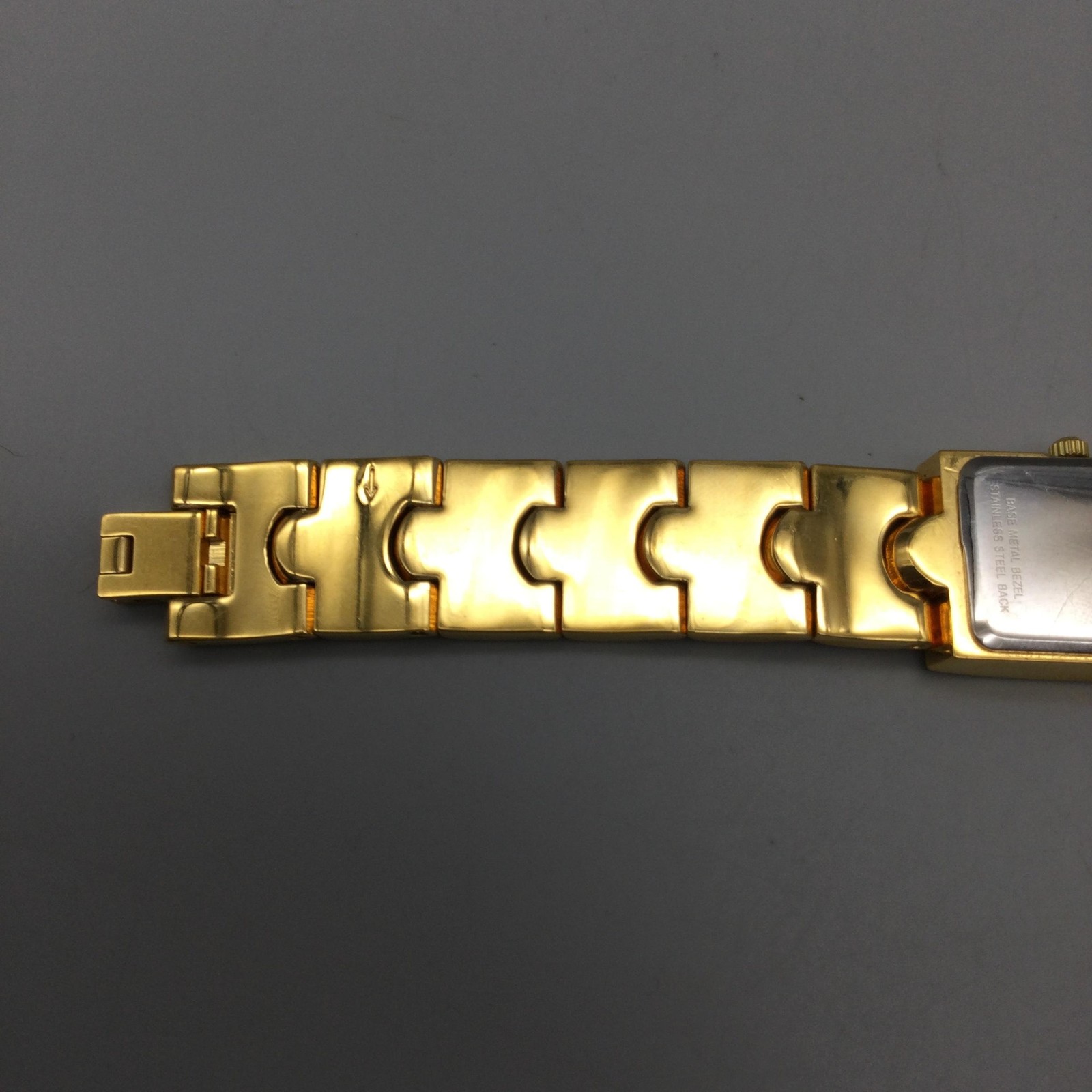Caravelle By Bulova Womens Watch 17mm Gold Tone Tank Diamond New Battery 6″