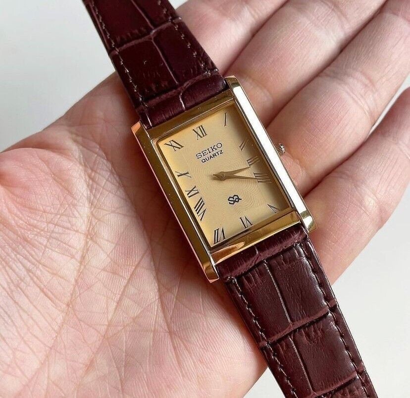 Vintage Seiko Slim Quartz Gold Face Rectangle Japanese 26MM Case Mens Watch S07