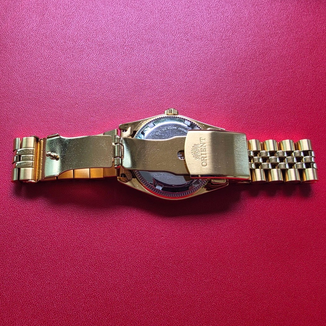 MEN’S ORIENT PRESIDENT 10 POINTS BLACK DIAL AUTOMATIC DAY DATE GOLD/SS