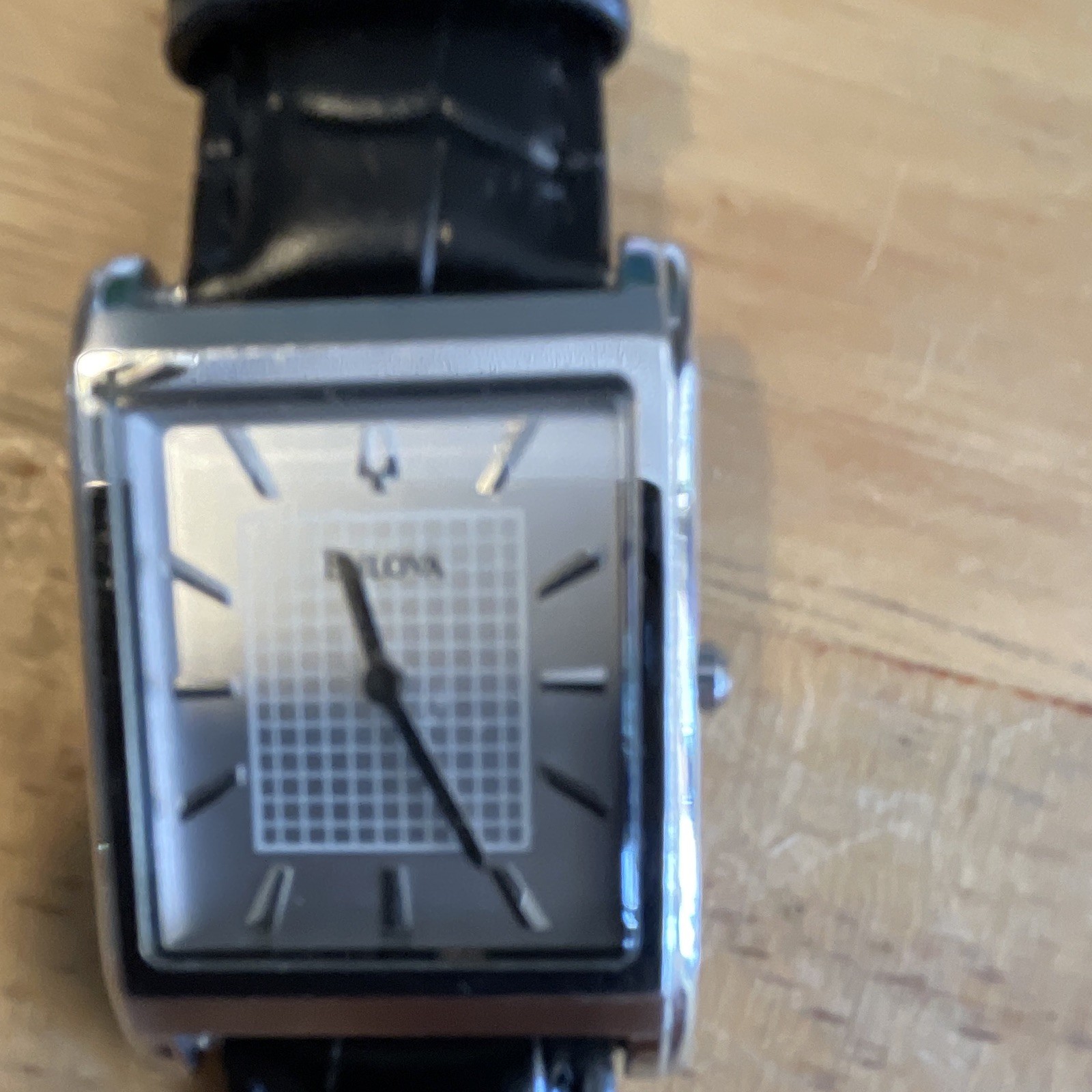 Bulova Quartz Analog Watch 28mm Silver Textured Dial Black Leather Strap WR