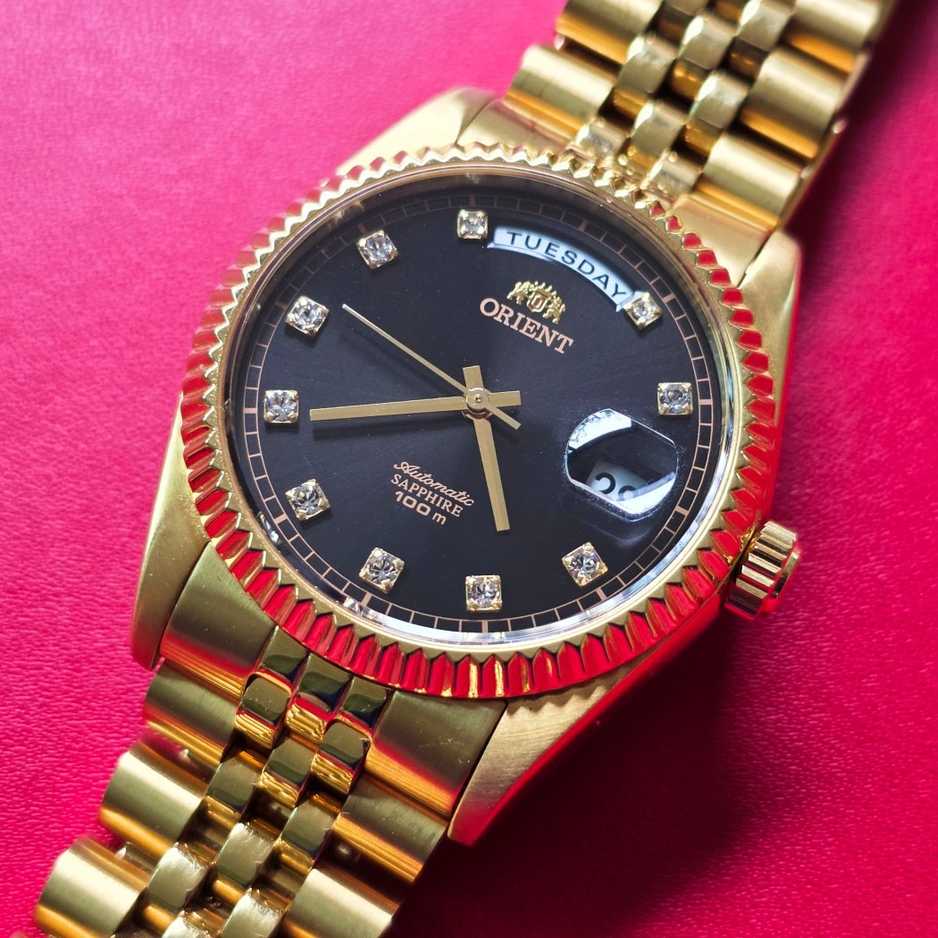 MEN’S ORIENT PRESIDENT 10 POINTS BLACK DIAL AUTOMATIC DAY DATE GOLD/SS