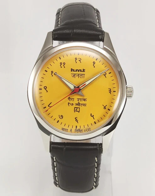 HMT Janata Devanagari Yellow Dial Hand Winding Transparent Back Mens Wrist Watch