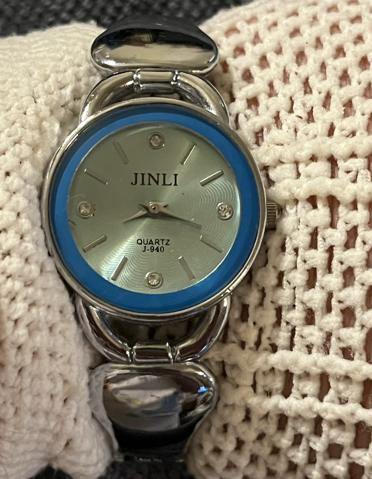 JINLI Women’s Quartz Analog Silver Tone Bracelet Watch w/ Blue Fixed Bezel