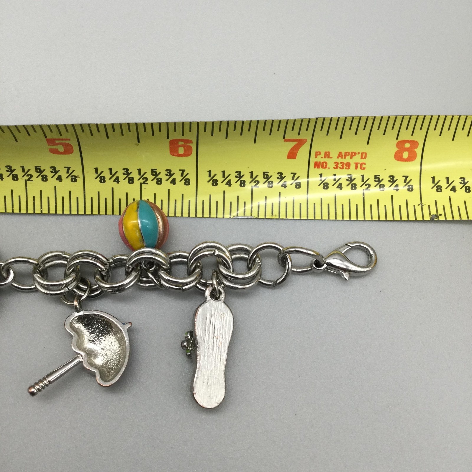 Bay Studio Charm Watch Womens 22mm Silver Tone Beach Charms New Battery 7.5″