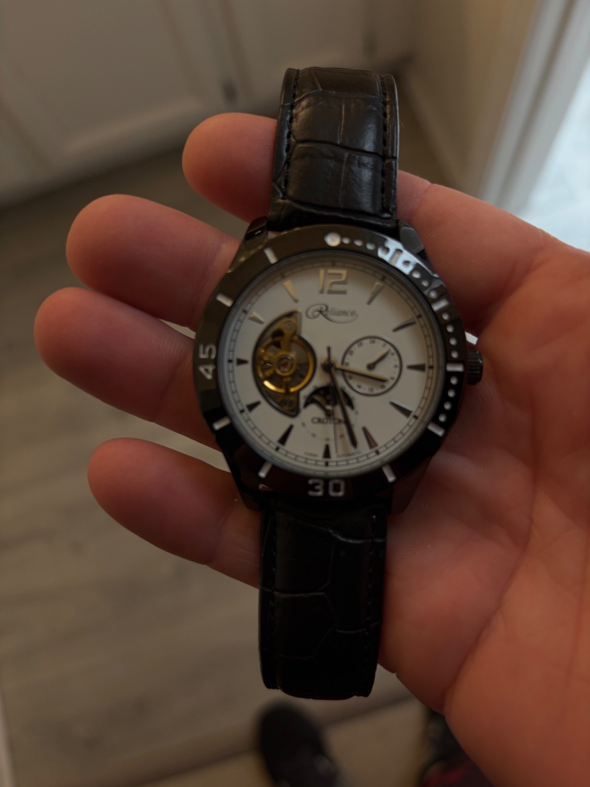 Small watch collection; Croton, Casio, Nautica, and Vincero