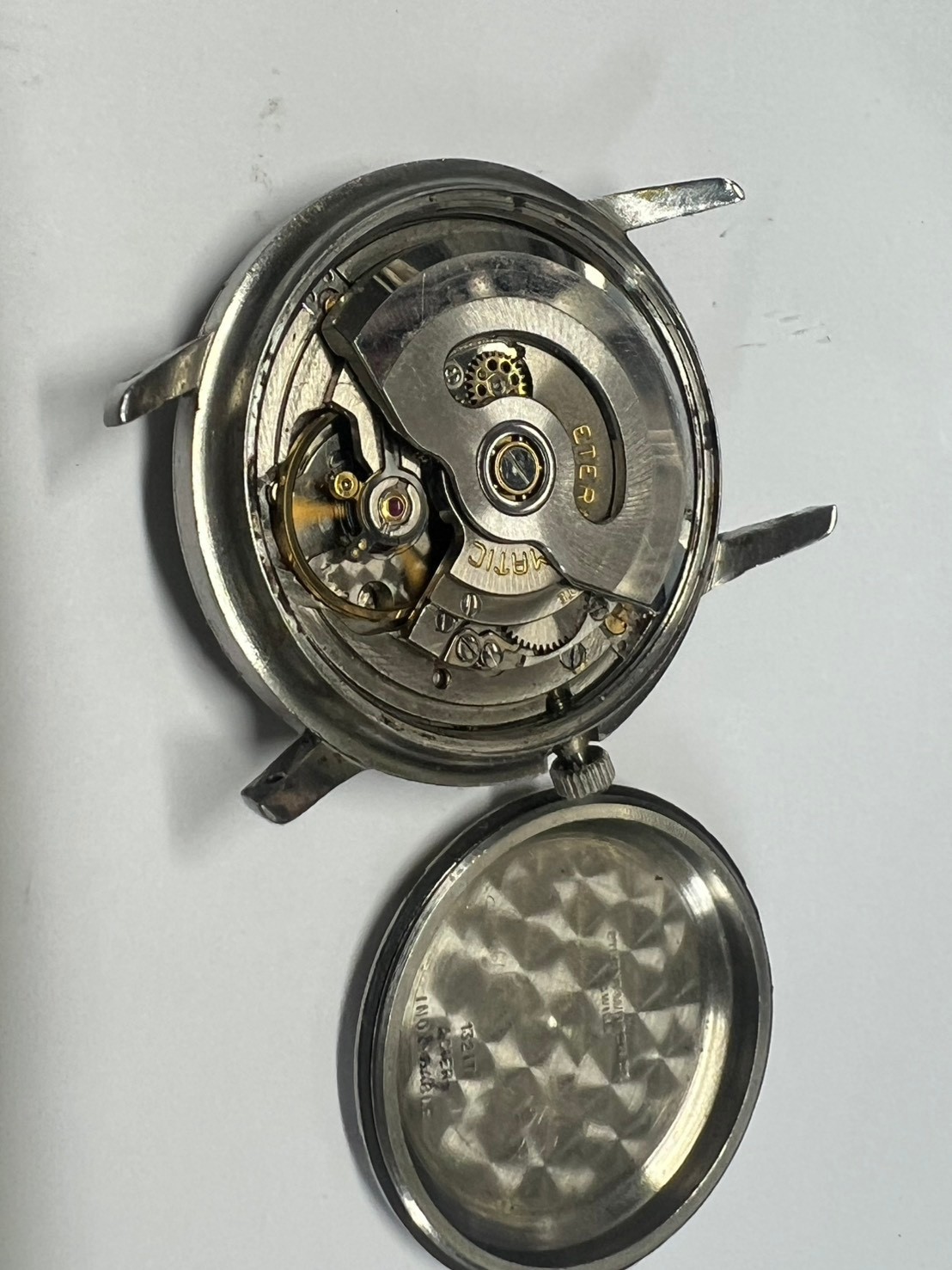 4. Eterna Matic cal 1412 autometic 34 mm running broken bezel