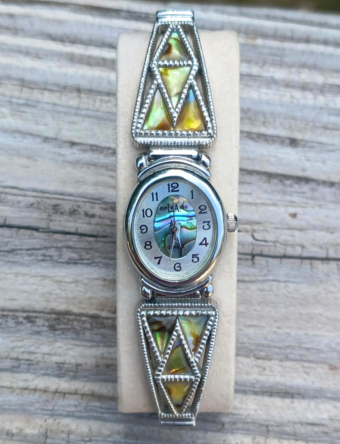LA Express Women’s Stretch Wristwatch SilverTone Abalone Oval Face – New Battery