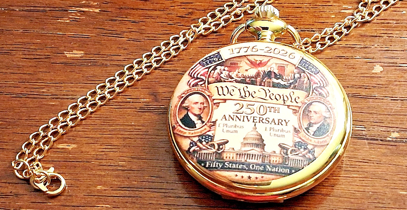 Gold tone comememorative pocket watch titled Anniversary We the People