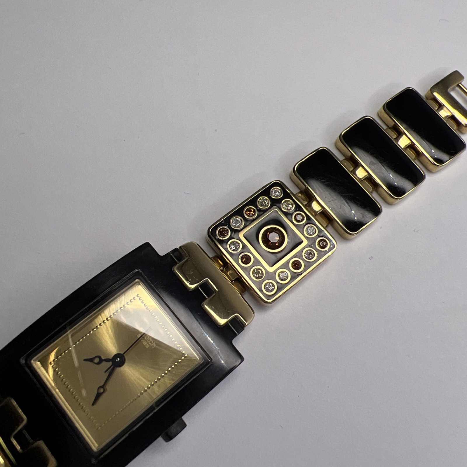 Swatch Square Watch SUBM104G AG2006 Luxotric Gold Tone & Black Quartz Watch
