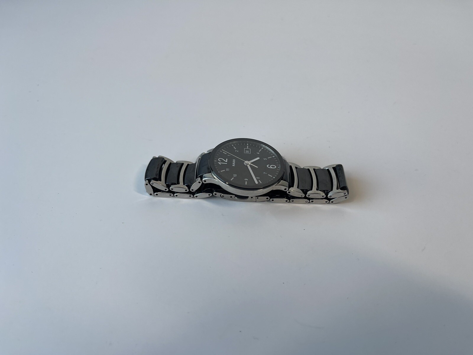 Rado Centrix Black Dial Unisex Watch, ceramic bracelet with titanium clasp.