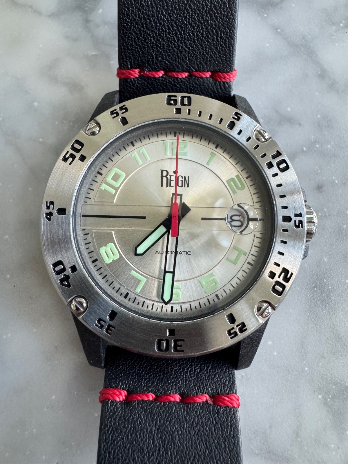 Reign Automatic Men’s Watch Black Case and Silver Dial with Red and Green Accent