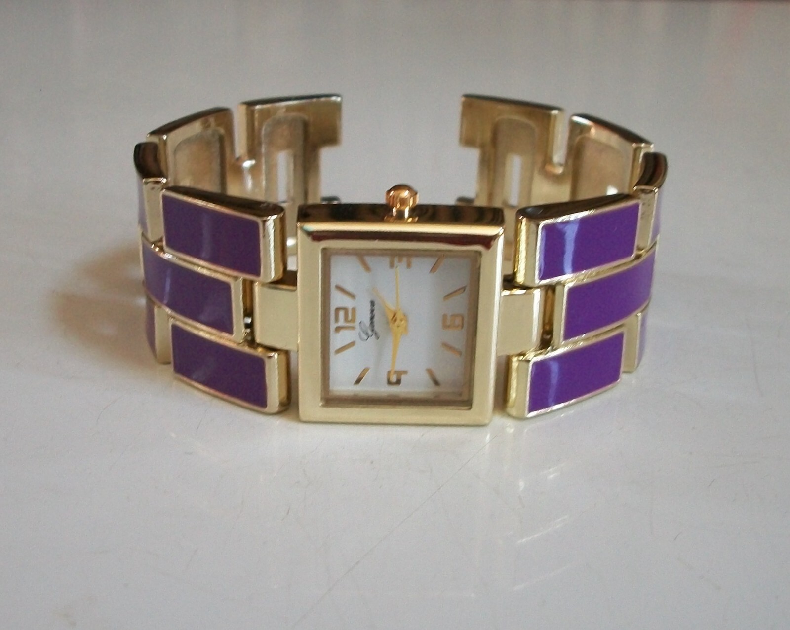 WOMEN’S GOLD FINISH PURPLE,PINK, MINT, PEACH, BLACK BANGLE CUFF FASHION WATCH