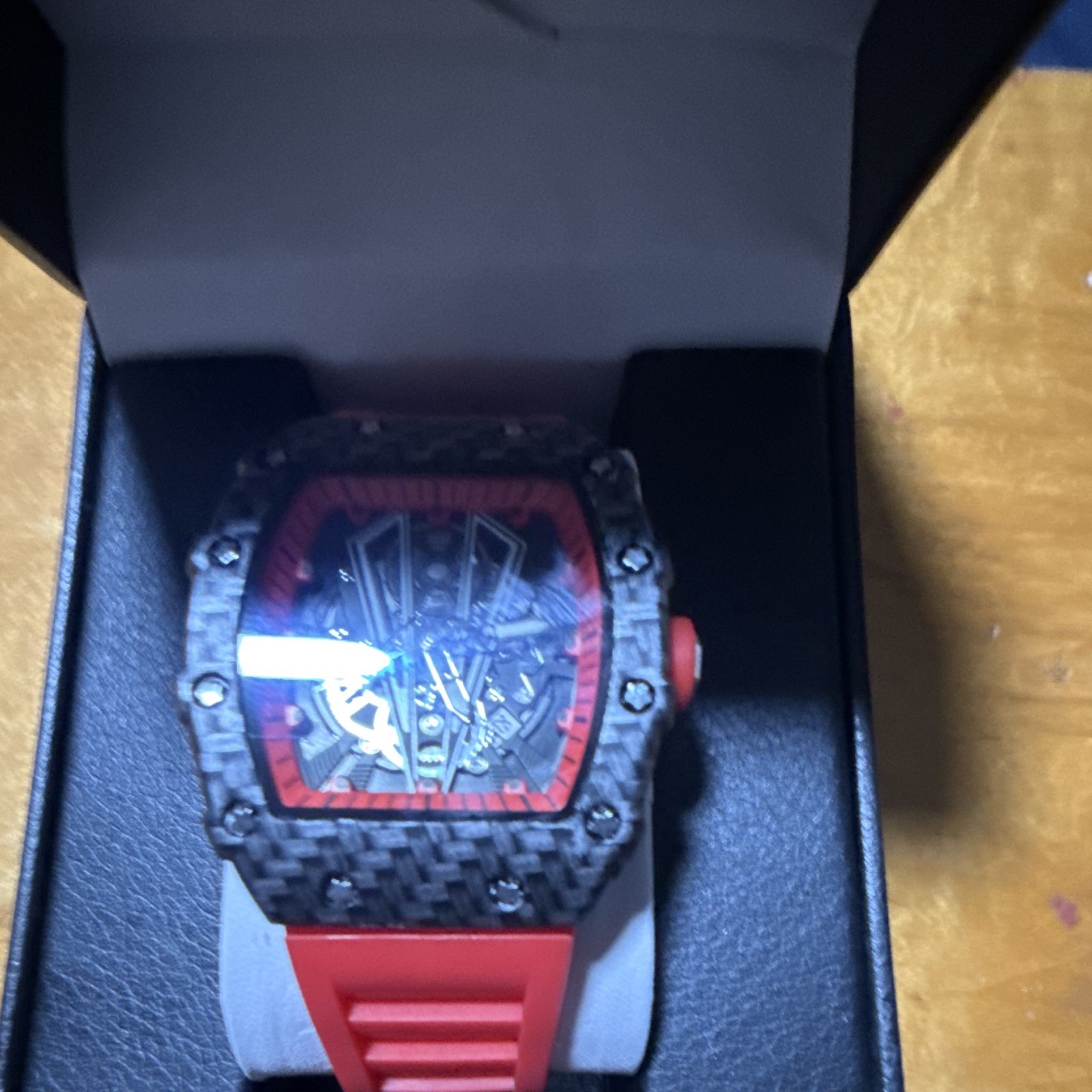 Men’s Tonneau Skeleton Dial Automatic Watch Black Carbon Fiber Case Red Strap