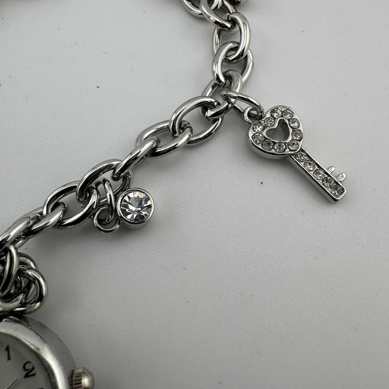 Charm Sz 8.7″ Bracelet Watch Womens White Dial Silver Tone Key Lock Ring Charms