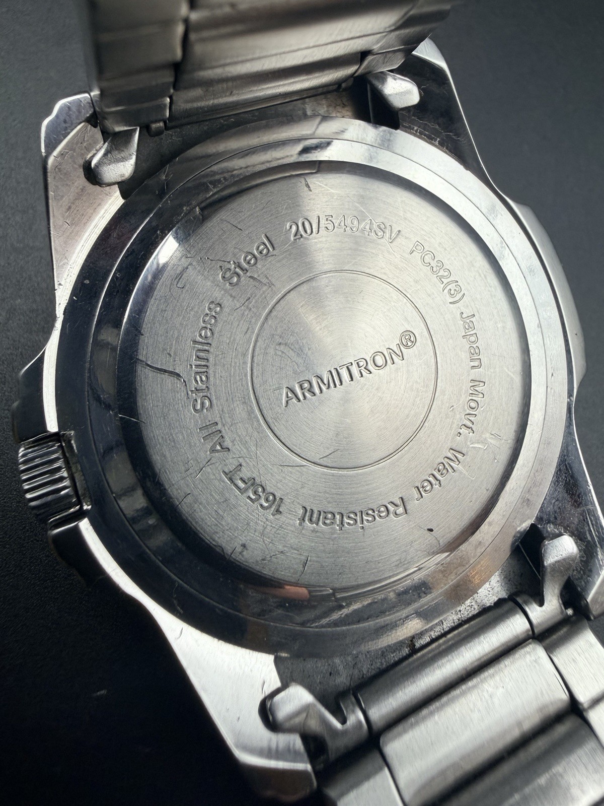 Armitron 20/5494SV Men’s Red Sunburst Dial Stainless Steel Quartz Watch Runs