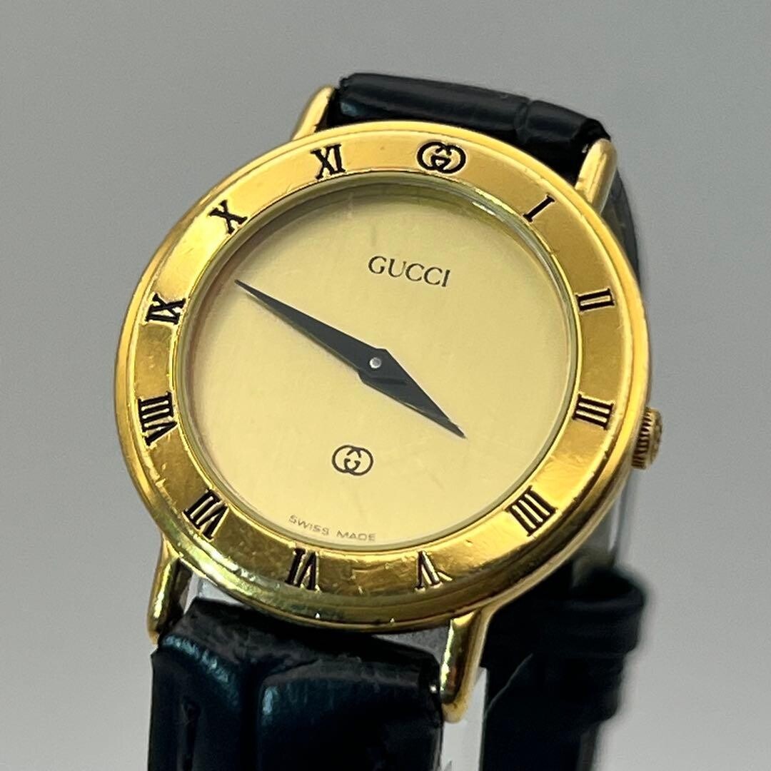 Gucci Womens 3000L Vintage Gold Roman Quartz Watch Black Strap 25.6mm