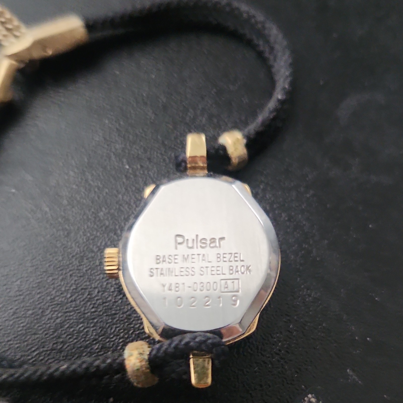 Pulsar Women’s Vintage Quartz Analog Gold Tone White Dial Black Cord Strap