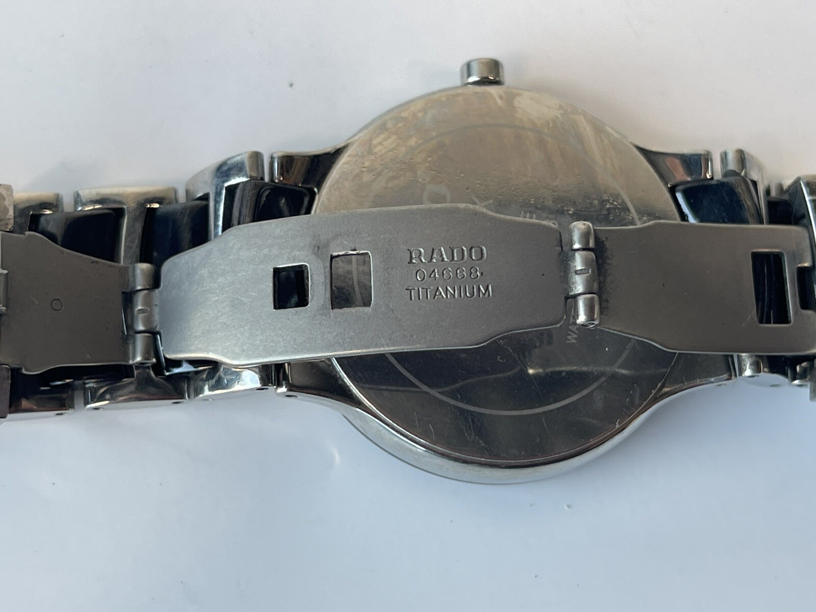 Rado Centrix Black Dial Unisex Watch, ceramic bracelet with titanium clasp.