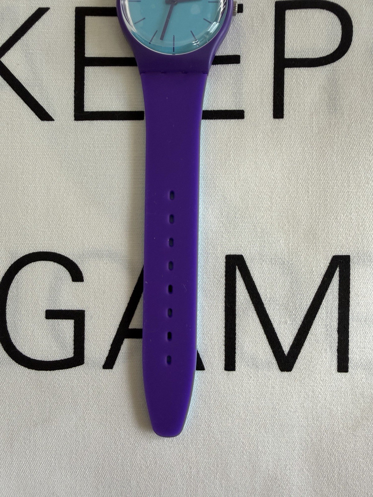 Swatch GV128 Polymer Watch – Turquoise Dial& Purple Strap – New in Box