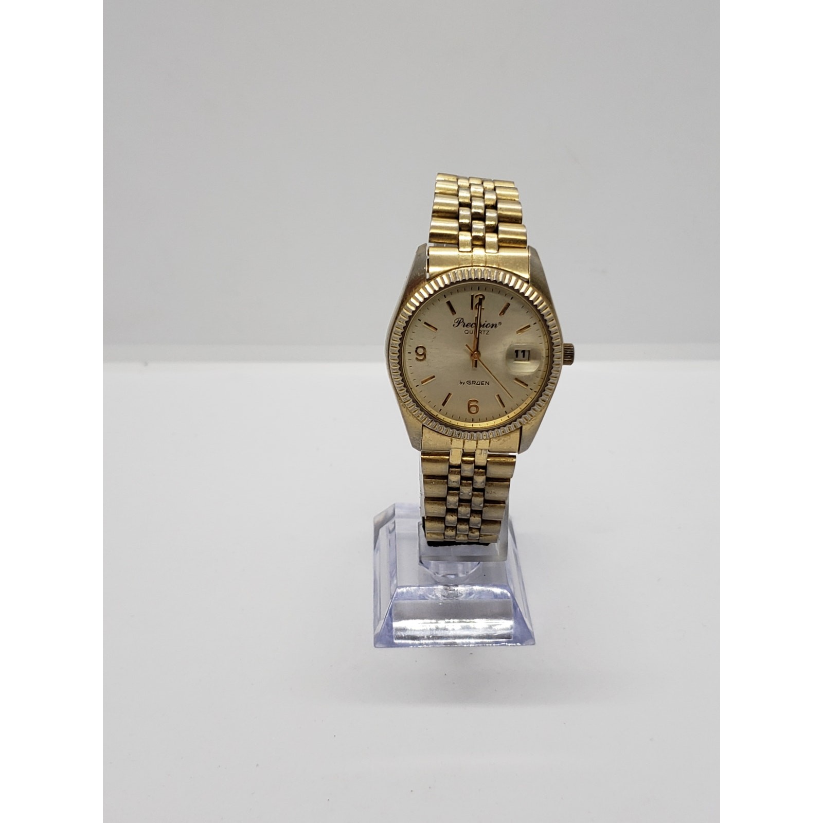 Precision Quartz by Gruen Men’s watch. Gold face and band. GP5036, 098, PC32