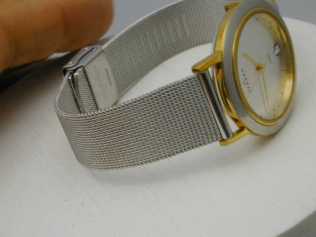 SKAGEN TWO TONE T MADE IN DENMARK RUNS GREAT, CRYSTAL FLAWED AS PICTURED.