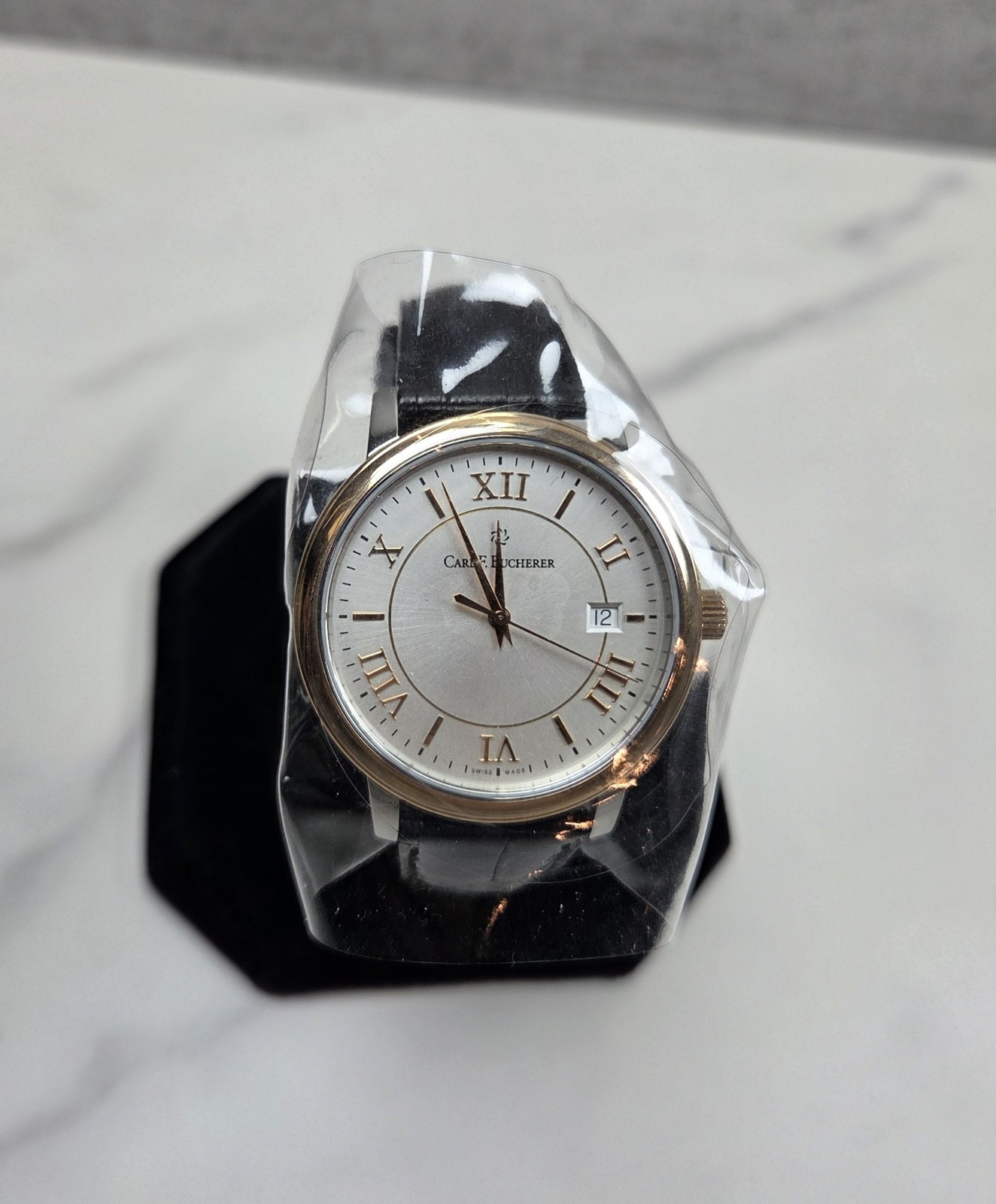 CARL F. BUCHERER ADAMAVI. STEEL AND 18K ROSE GOLD